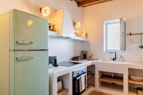 Köök või kööginurk majutusasutuses Makarias Traditional Luxury Villas