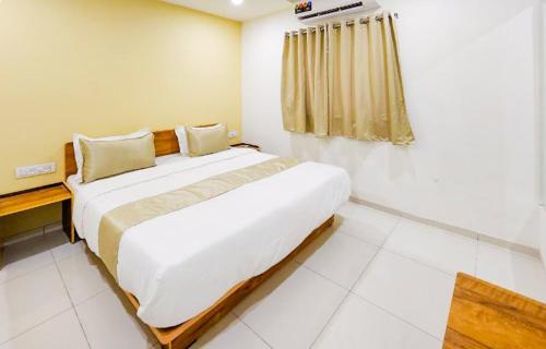 Hotel Nova Safalにあるベッド