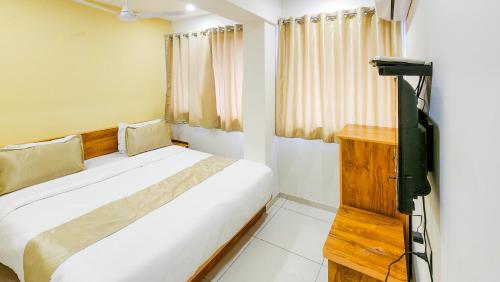 Hotel Nova Safalにあるベッド