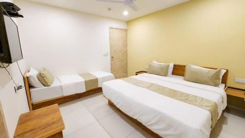 Hotel Nova Safalにあるベッド