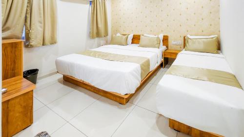 Hotel Nova Safalにあるベッド