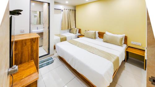 Hotel Nova Safalにあるベッド