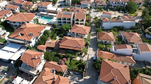 an overhead view of houses with red roofs at Studio Nikiti Beach in Nikiti