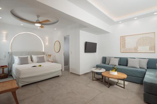 a living room with a bed and a couch at Agia Anna Living in Agia Anna Naxos