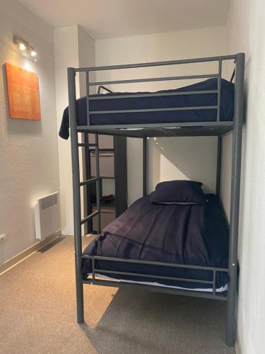 Ένα ή περισσότερα κρεβάτια σε δωμάτιο στο Appartement 4 personnes 541 les Jasses de Camargue