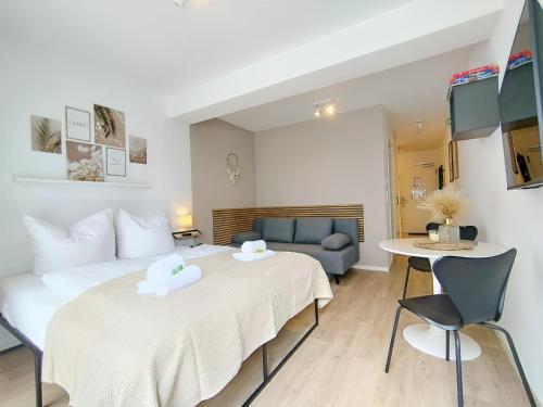 Postel nebo postele na pokoji v ubytování Bohotastic Apartment für bis zu 4, Terrasse, Grill