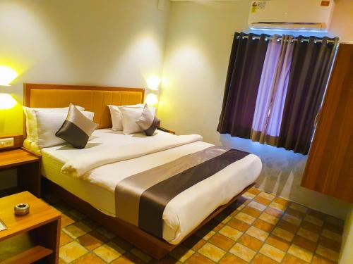 Un ou plusieurs lits dans un hébergement de l'établissement Hotel Nova Star