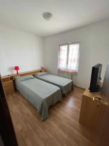 Giường trong phòng chung tại Casa Angel