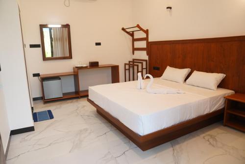 Letto o letti in una camera di Serendib villa