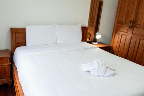 Koh Samui Resort & Restaurant - Villa Giacomelliにあるベッド