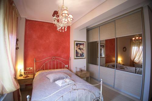 Ένα ή περισσότερα κρεβάτια σε δωμάτιο στο Venia House Marathos