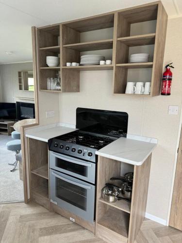 Η κουζίνα ή μικρή κουζίνα στο Caravan, Blue Dolphin, Filey