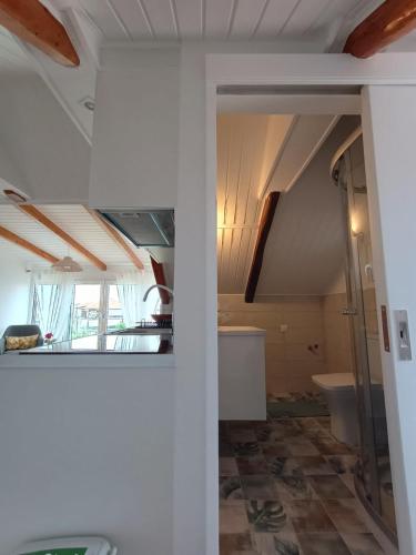 a room with a bathroom with a toilet and a ceiling at Perispit in Lefkada