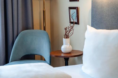Cama o camas de una habitación en Hotel Altmünchen by Blattl