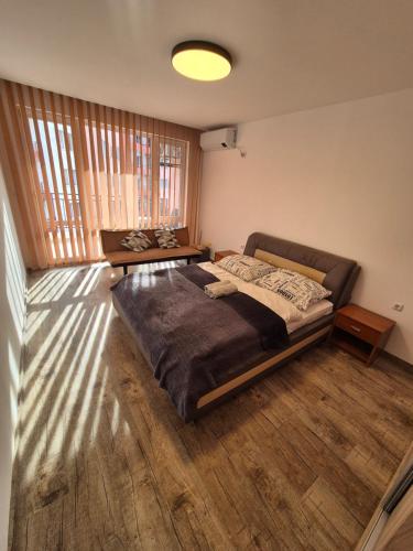 A bed or beds in a room at Apartmán TTT