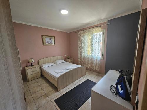 Llit o llits en una habitació de Bral Apartments