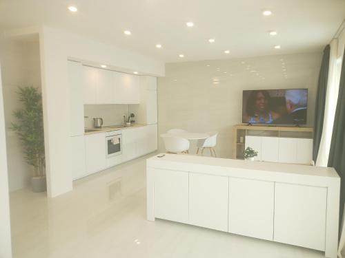 Kuchyň nebo kuchyňský kout v ubytování Smart Luxury Suites & Apartments