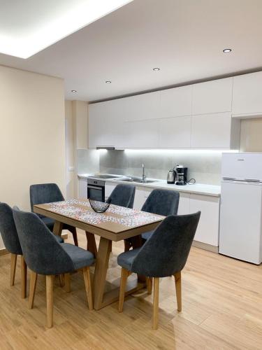 Kuchyň nebo kuchyňský kout v ubytování ODORE DI MARE APARTMENTs