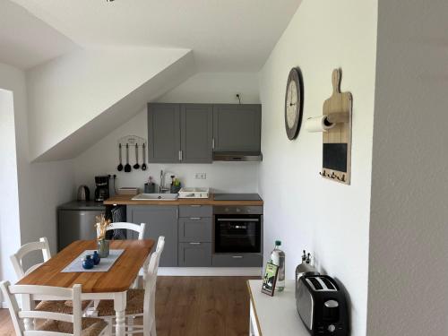 Kuchyň nebo kuchyňský kout v ubytování Ferienwohnung Zum Aatal