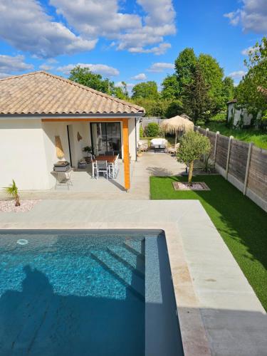 Photo de la galerie de l'établissement Maison avec piscine, à Lanton