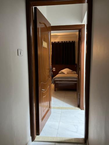 Postel nebo postele na pokoji v ubytování Royal hotel Tanta - فندق رويال طنطا