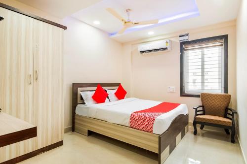 Postel nebo postele na pokoji v ubytování Super Capital O RR Towers by CJ