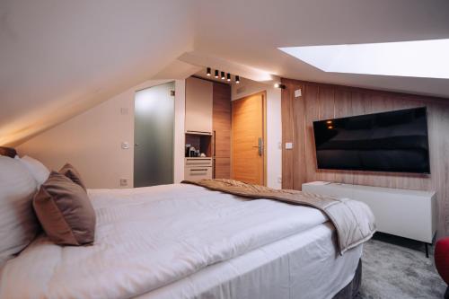 Letto o letti in una camera di Villa Pupin SARAISTE