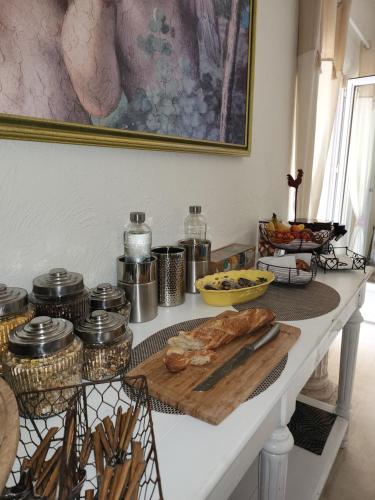 a table with a bunch of food on it at Le Clos Renaissance in Oppède