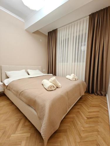 Llit o llits en una habitació de Ena Apartment