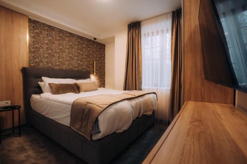 Letto o letti in una camera di Villa Pupin SARAISTE