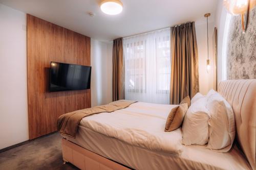 Letto o letti in una camera di Villa Pupin SARAISTE