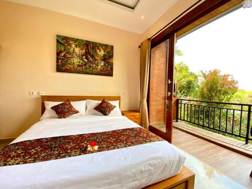 Ένα ή περισσότερα κρεβάτια σε δωμάτιο στο Lekok House Bali
