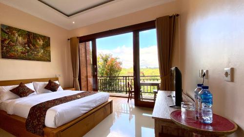 Ένα ή περισσότερα κρεβάτια σε δωμάτιο στο Lekok House Bali