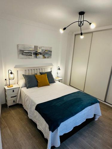 Ένα ή περισσότερα κρεβάτια σε δωμάτιο στο Casa Cami