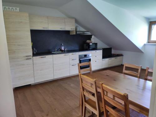 Kuchyň nebo kuchyňský kout v ubytování Apartmán Pivoňka
