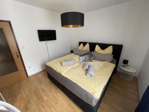 Postel nebo postele na pokoji v ubytování Enna Apartment A Meerblick perfect location