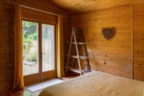 Postel nebo postele na pokoji v ubytování Les Amandiers Bugarach gîte en belle nature