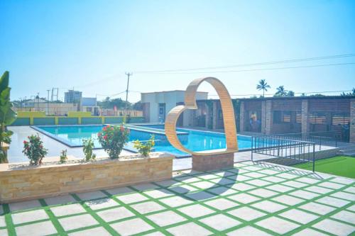 a rendering of a swimming pool with an arch at The Residence Hotel Dodoma in Dodoma
