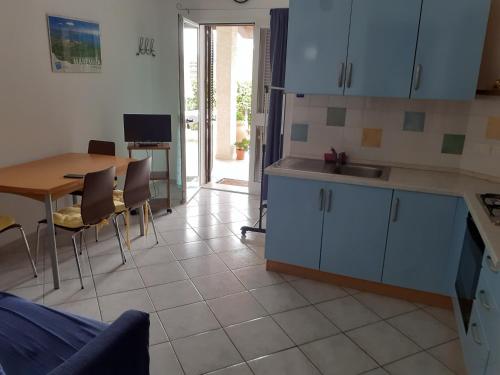 Η κουζίνα ή μικρή κουζίνα στο Rispescia Casa Vacanze Grosseto
