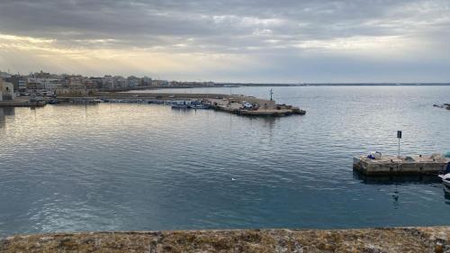 a view of a large body of water with boats at Kasa Celeste Aida in Gallipoli