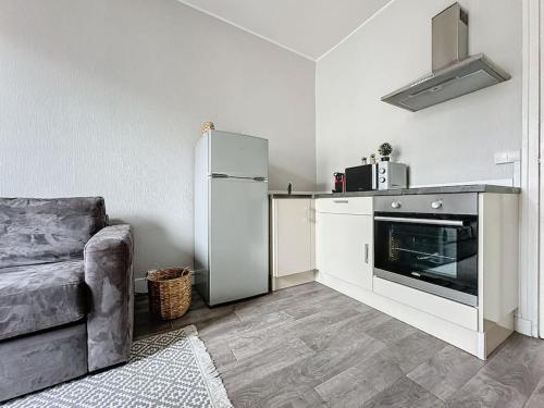 Kuchyň nebo kuchyňský kout v ubytování Studio Chantilly Gare