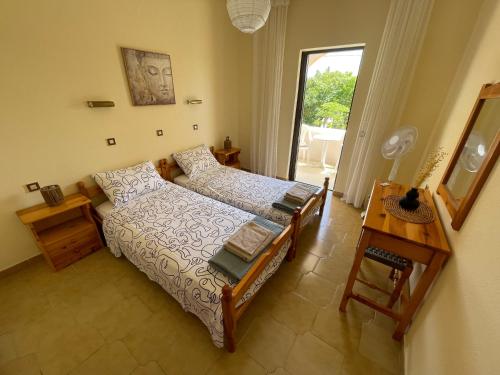 Postel nebo postele na pokoji v ubytování Stay Corfu Studios