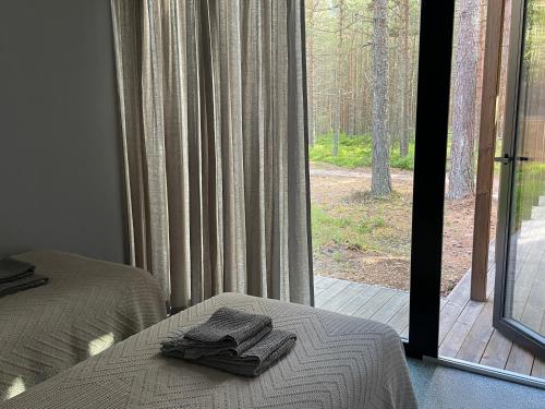 Postel nebo postele na pokoji v ubytování Dirhami Nature Resort
