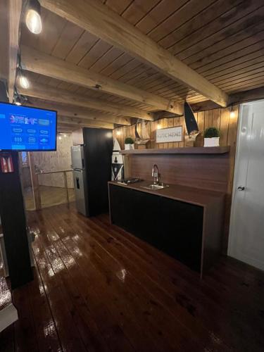 Kuchyň nebo kuchyňský kout v ubytování Neymar Beach House