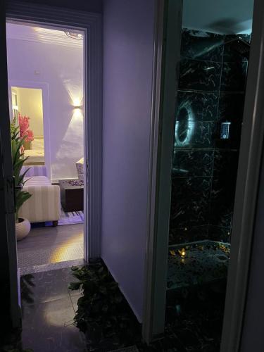 a door to a room with a view of a room at Downtown view studios in Cairo