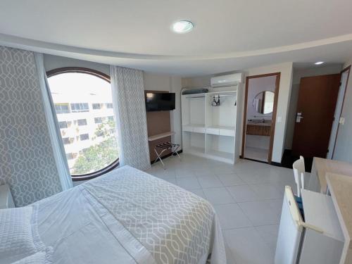 Kuchyň nebo kuchyňský kout v ubytování Violeta Meaípe Hotel