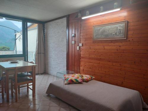 Posteľ alebo postele v izbe v ubytovaní TERRAZZA SULLE DOLOMITI