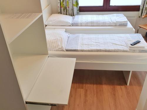 Ένα ή περισσότερα κρεβάτια σε δωμάτιο στο Aparthotel Jonas