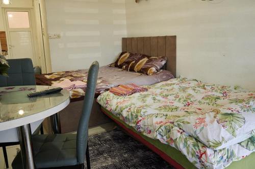 Katil atau katil-katil dalam bilik di Apartman Lili