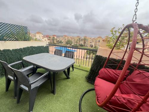 Χώρος καθιστικού στο Appartement MARIA résidence privée avec piscine